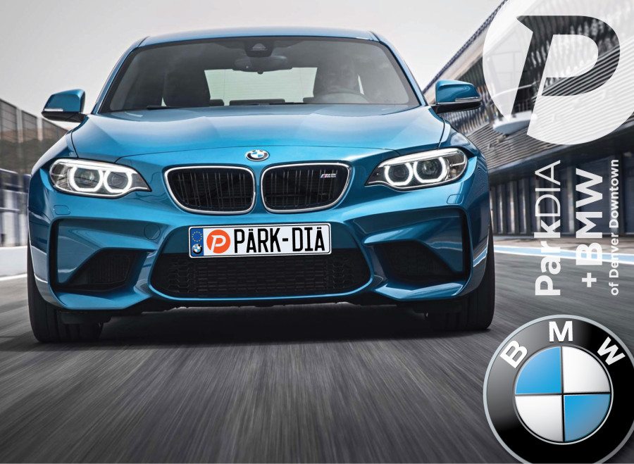 ParkDIA Partners with BMW of Denver Downtown - Blue BMW driving on road