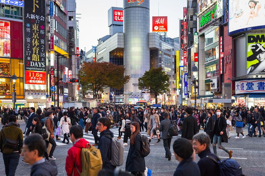 TOKYO, JAPAN - NOVEMBER 12, 2016: Crosswalk at Ikebukuro district of Tokyo metropolis, Japan. Tokyo Metropolis is both the capital and most populous city of Japan.